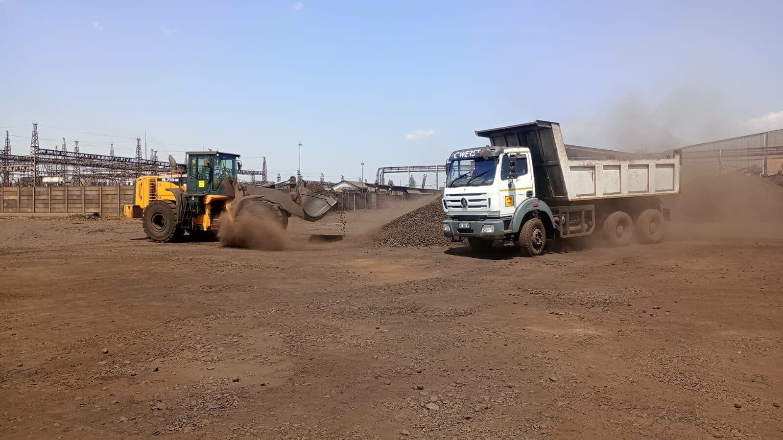 Wheel loader loading a dump truck